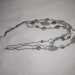 Silver and Tan Multi-Strand Necklace with Beads and Elements